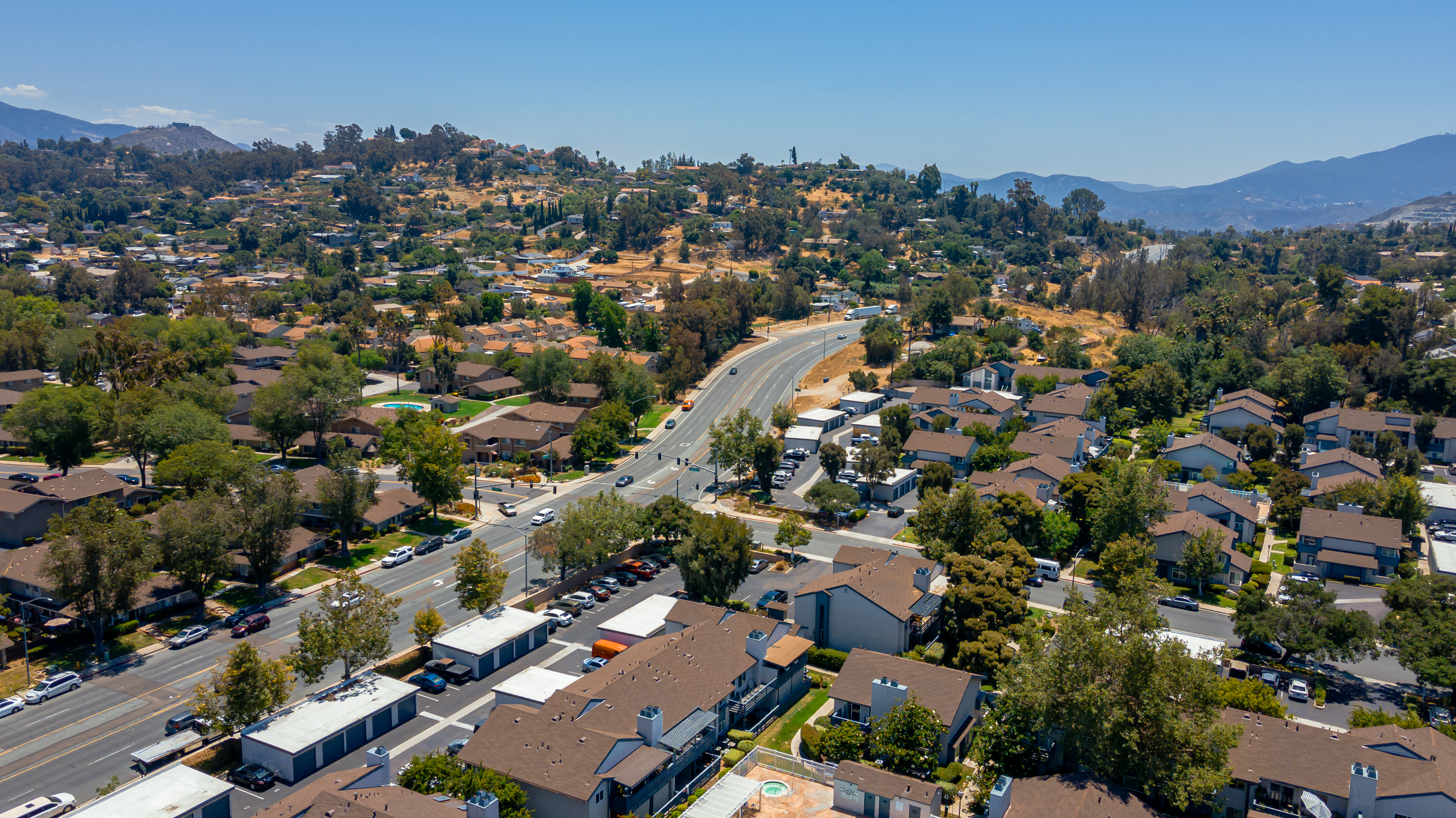 Aerial photography showing San Diego inland residential community and canyon